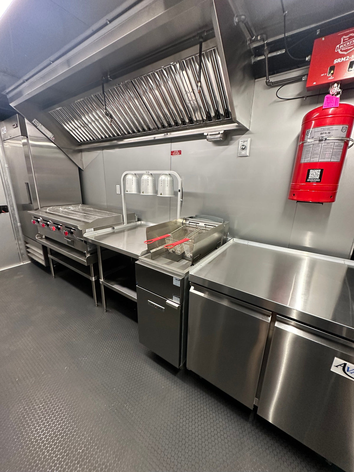 14 FT Burger Trailer side profile with the serving shelf folded down