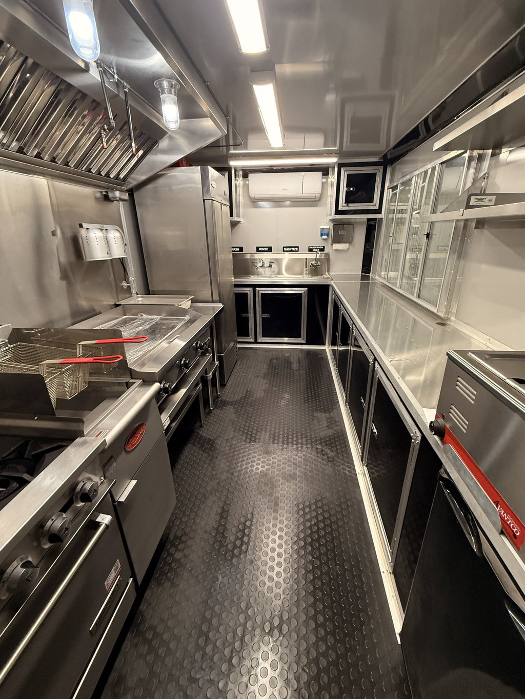 14 FT yellow cooking trailer, interior fryer and griddle under the hood vent