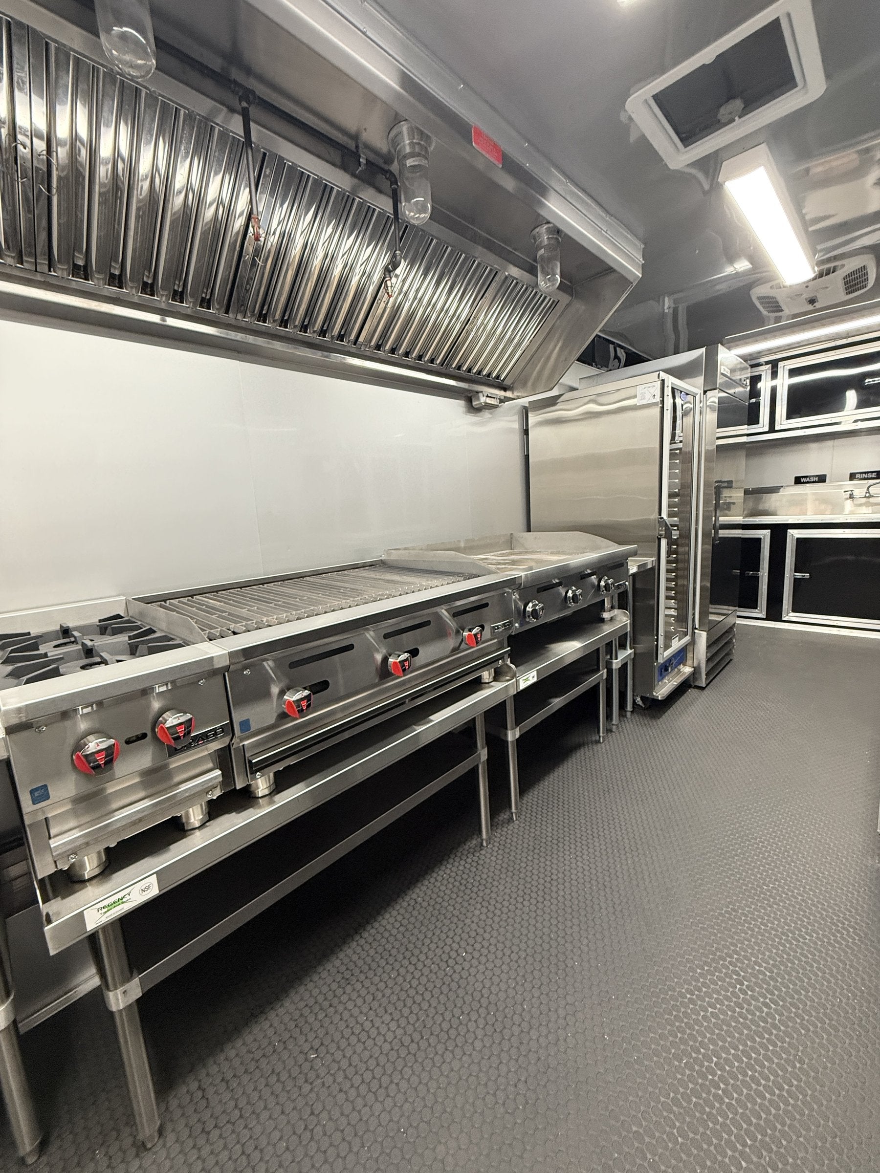 26 FT concession porch trailer, fully loaded, interior griddle and range along the cook line
