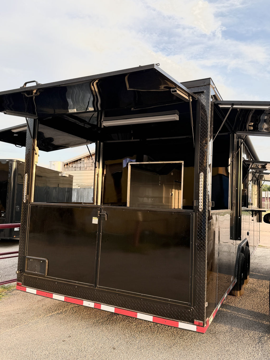 26 FT concession porch trailer, fully loaded, exterior rear with gull wing doors open