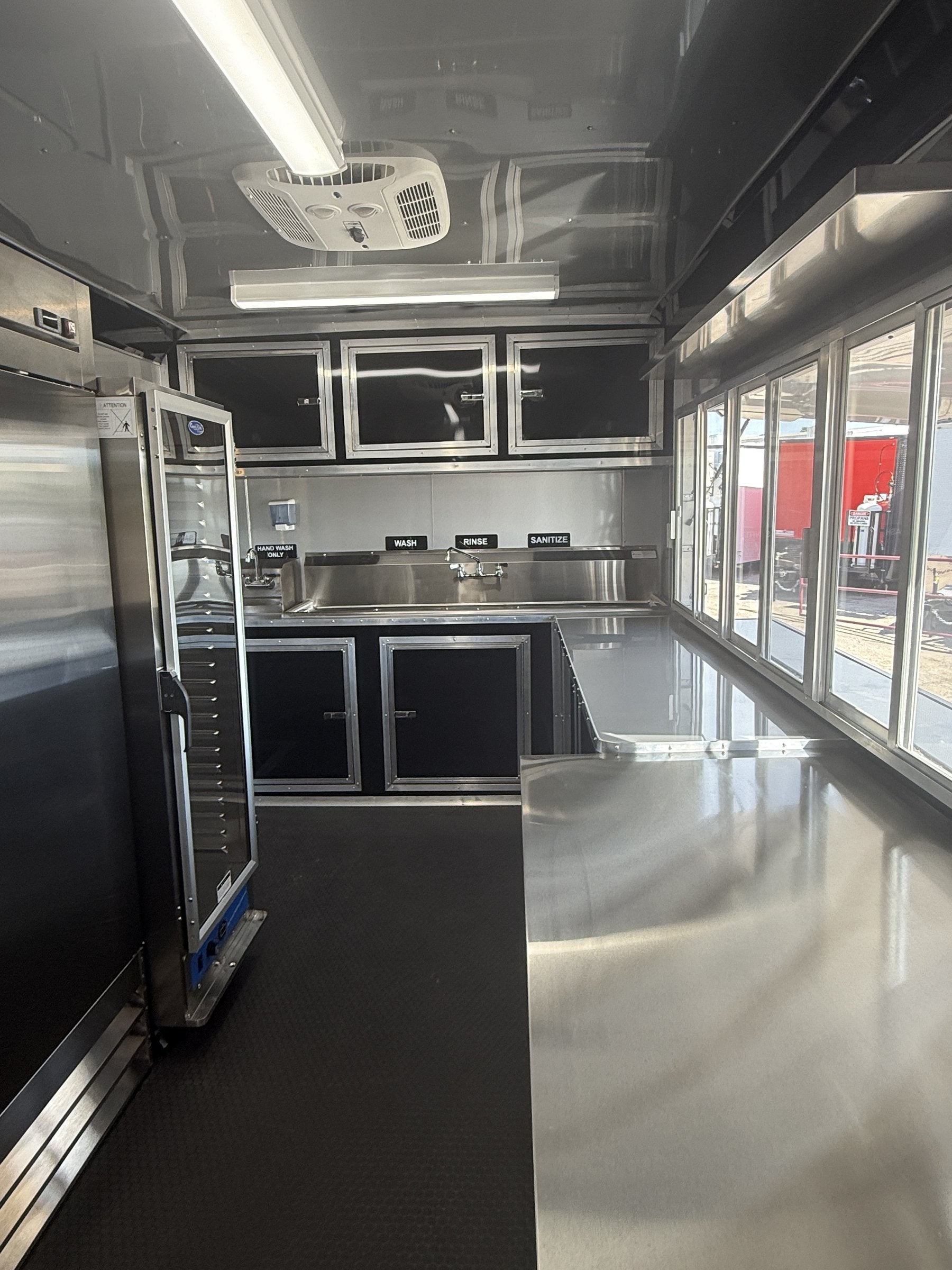 26 FT concession porch trailer, fully loaded, interior prep area with worktop freezer