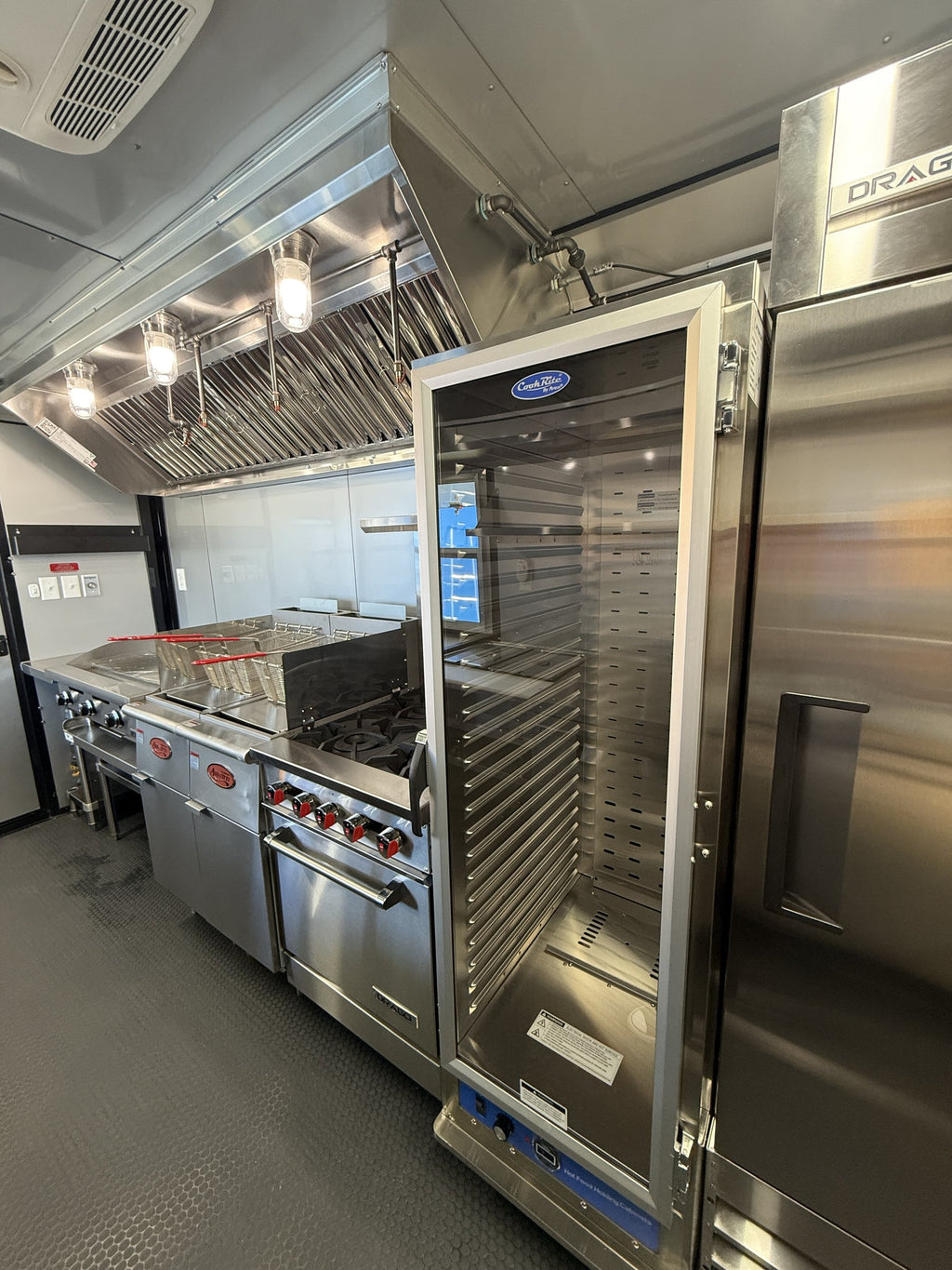 28 FT smoker concession trailer with restroom, interior stainless prep and equipment