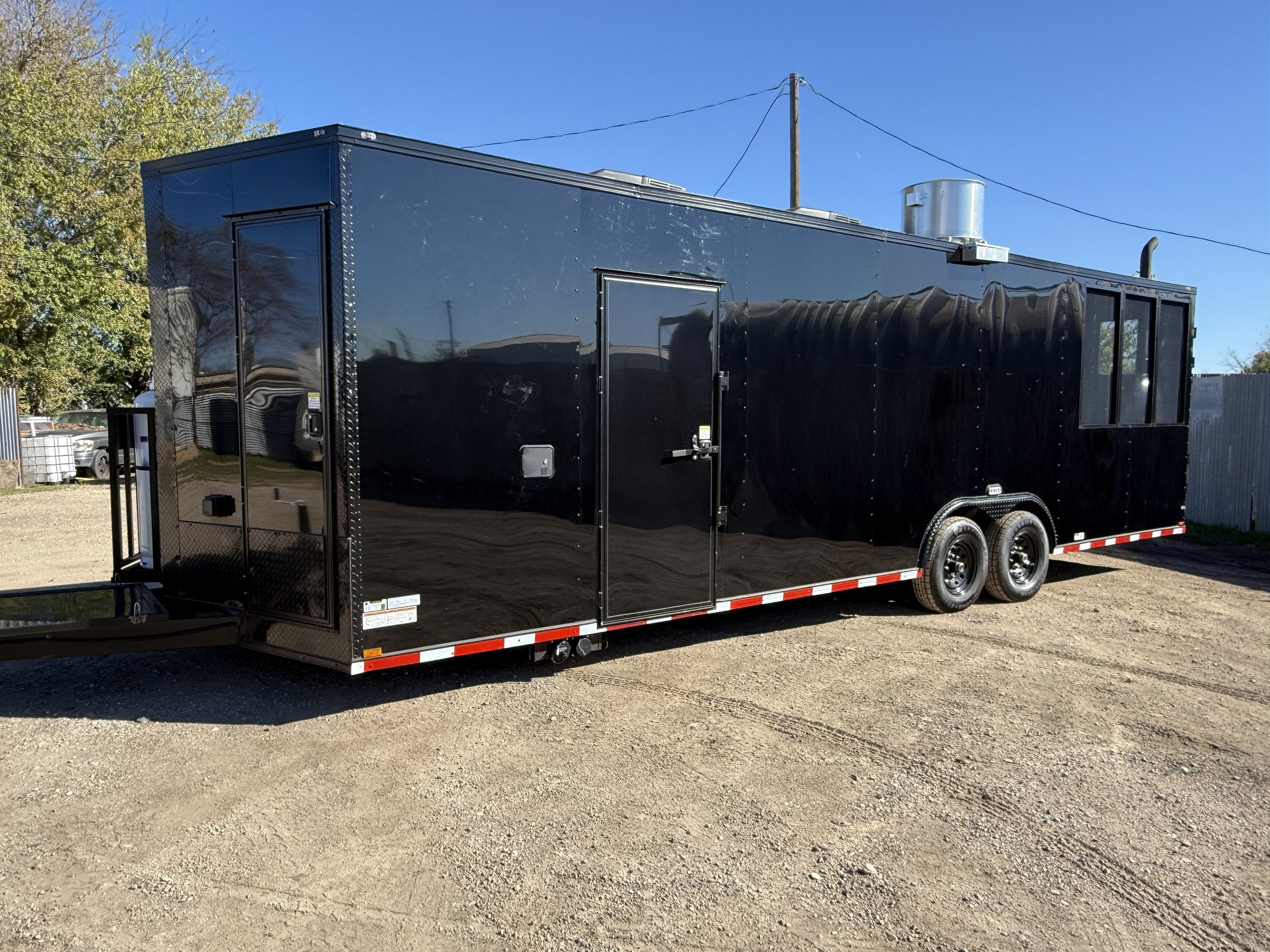 28 FT smoker concession trailer with restroom, exterior side profile in daylight
