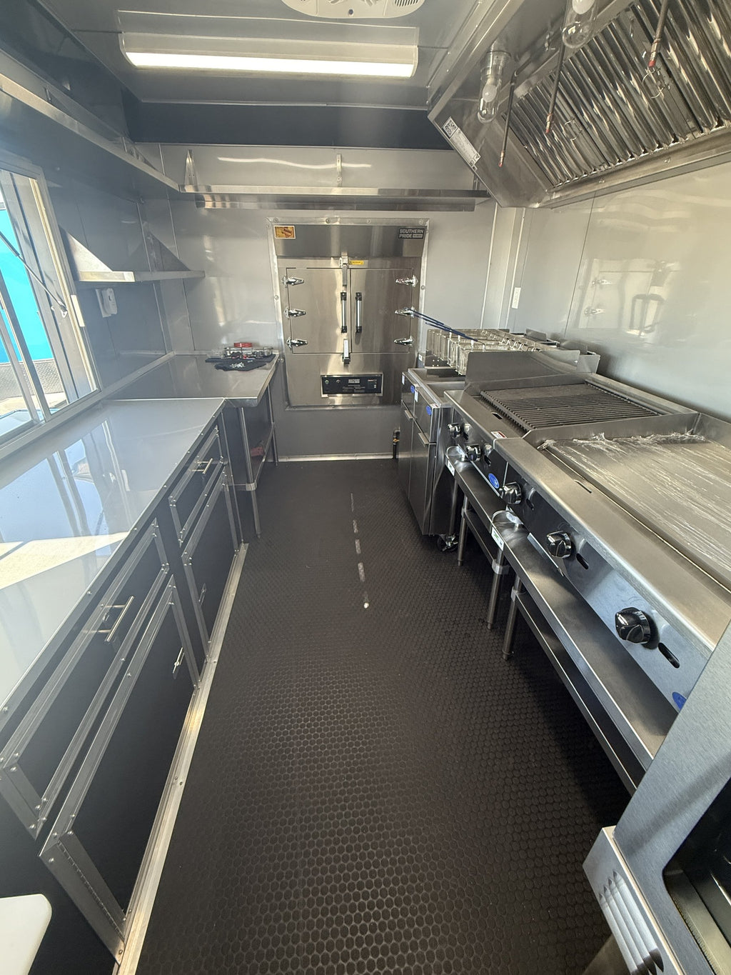 40 FT gooseneck smoker concession trailer, interior stainless galley looking toward the front