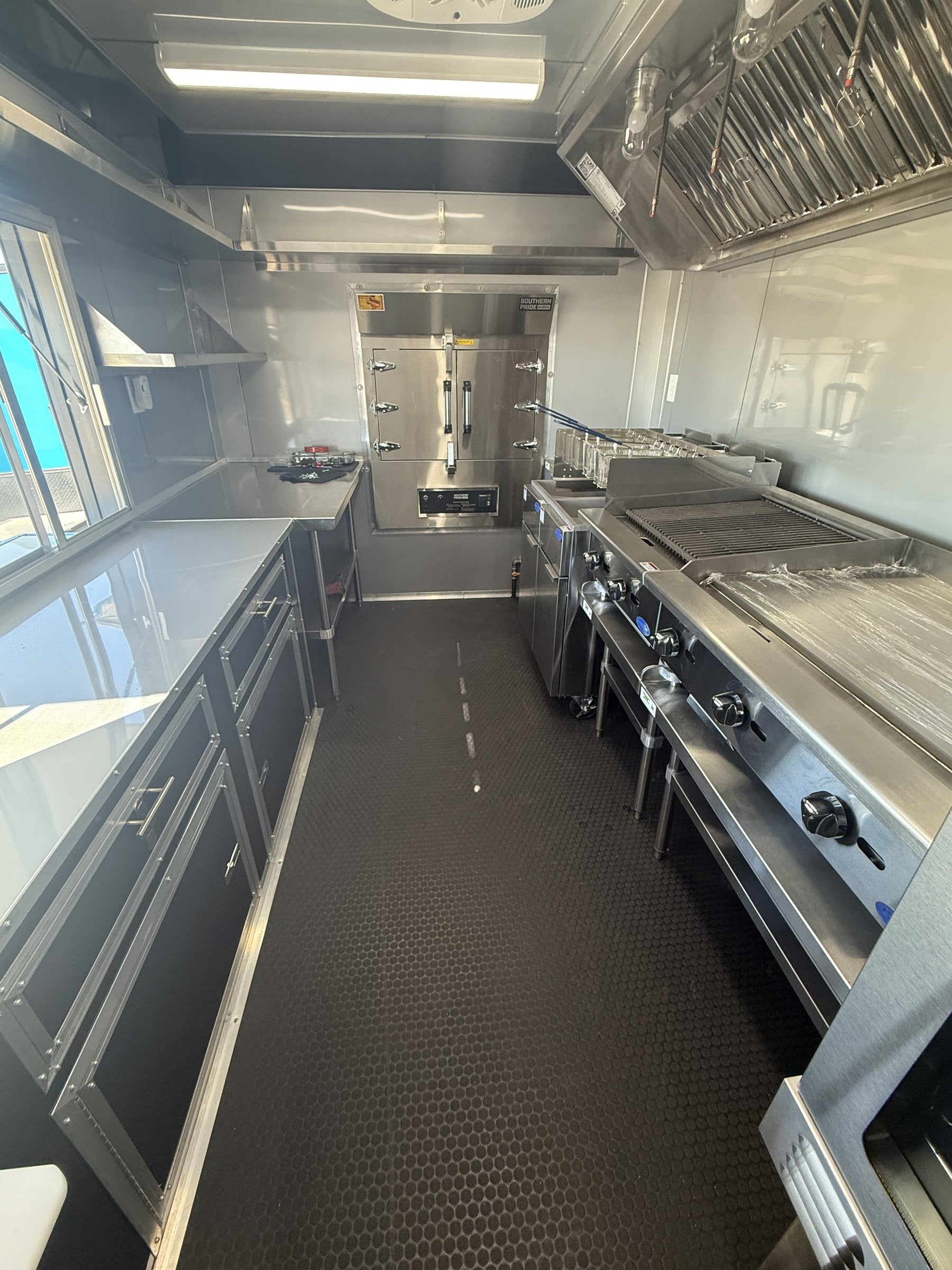 40 FT gooseneck smoker concession trailer, interior stainless galley looking toward the front