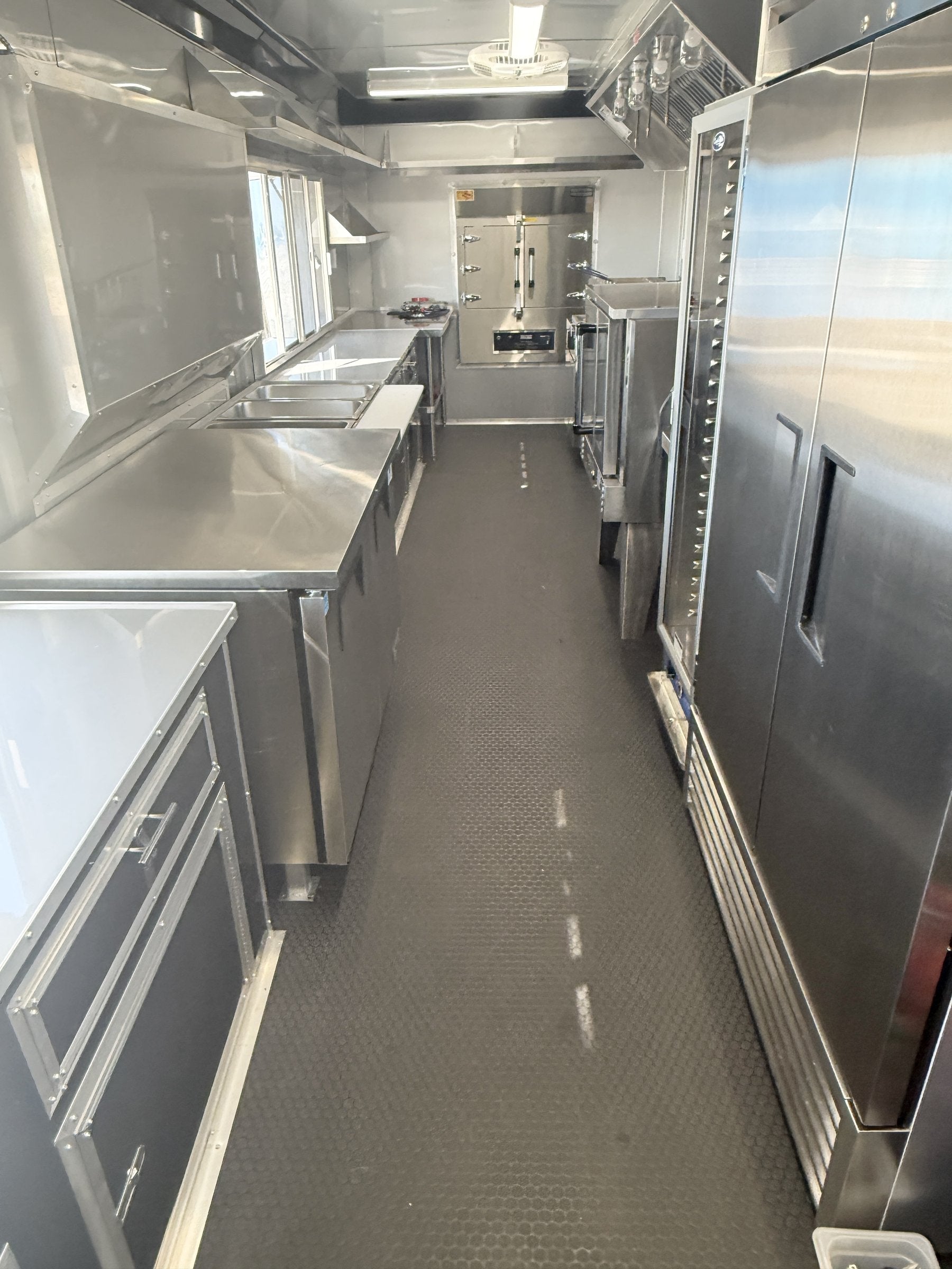 40 FT gooseneck smoker concession trailer, interior galley looking down the length