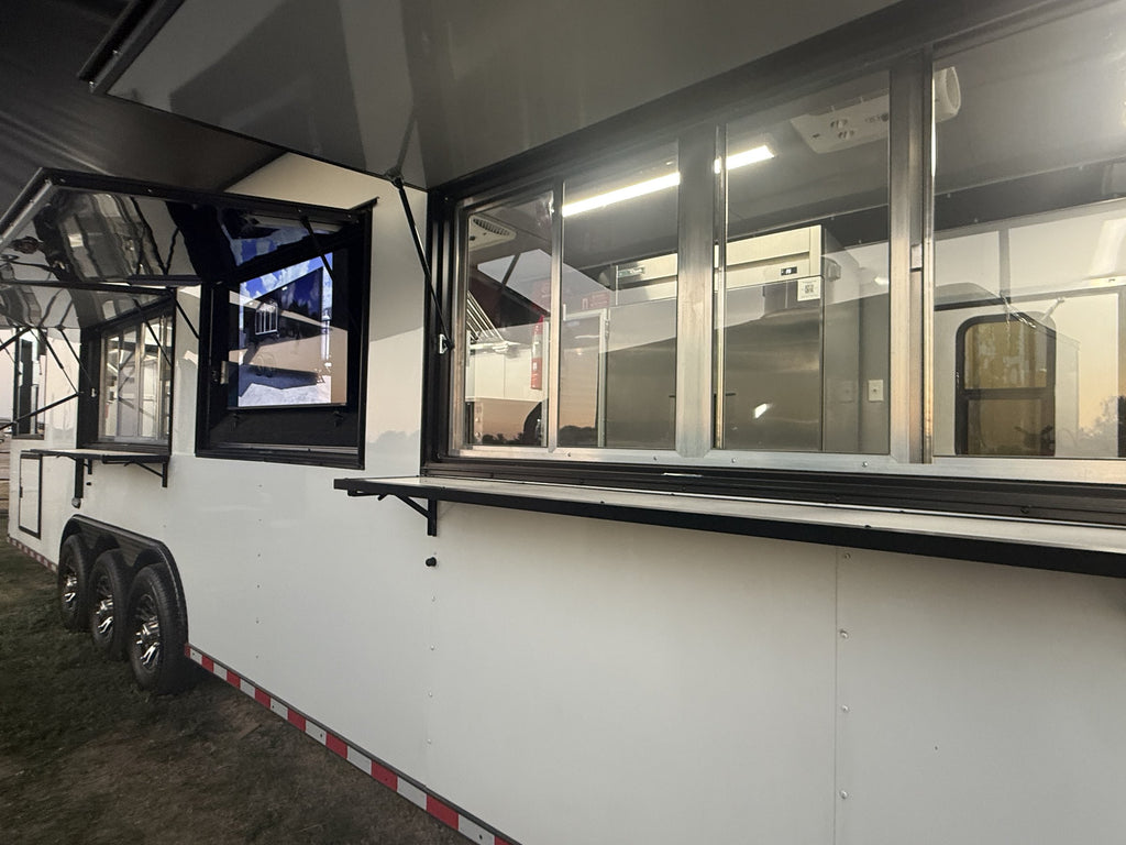 40 FT gooseneck smoker concession trailer, exterior side with awning and menu screen