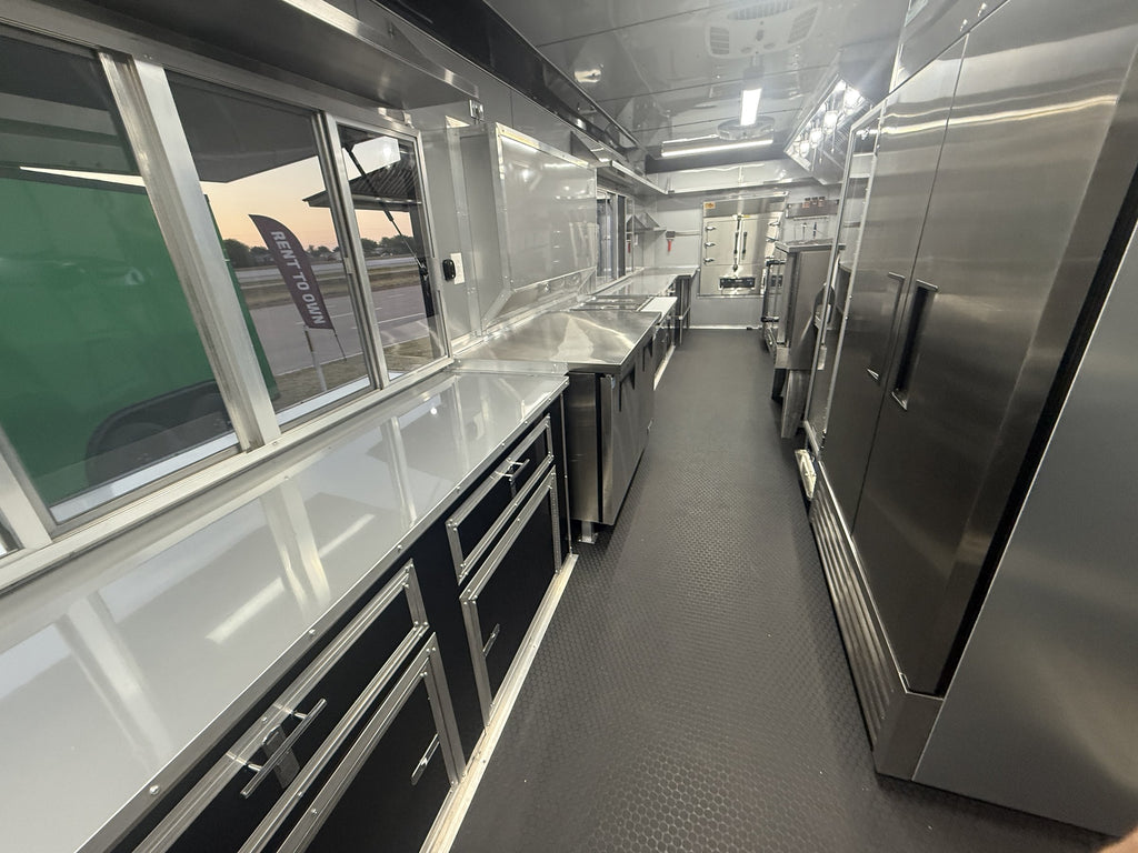 40 FT gooseneck smoker concession trailer, interior prep area with under-counter storage